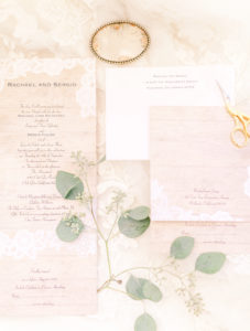 Wedding Invitation Details with Green Foliage