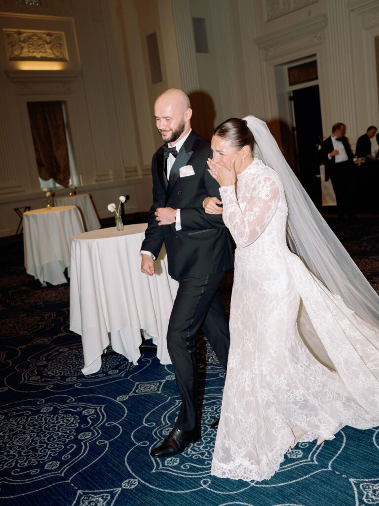Newlyweds entering the reception